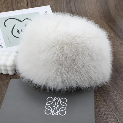 White Belro luxury faux fur winter hat with plush texture, stylish winter accessories for warmth and fashion.