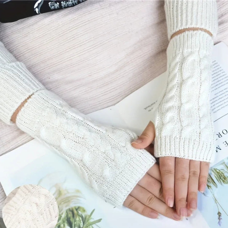 White knit women's winter fingerless gloves by Belro, cozy accessories with a textured knit pattern for warmth and style.