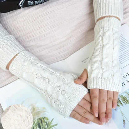 White knit women's winter fingerless gloves by Belro, cozy accessories with a textured knit pattern for warmth and style.
