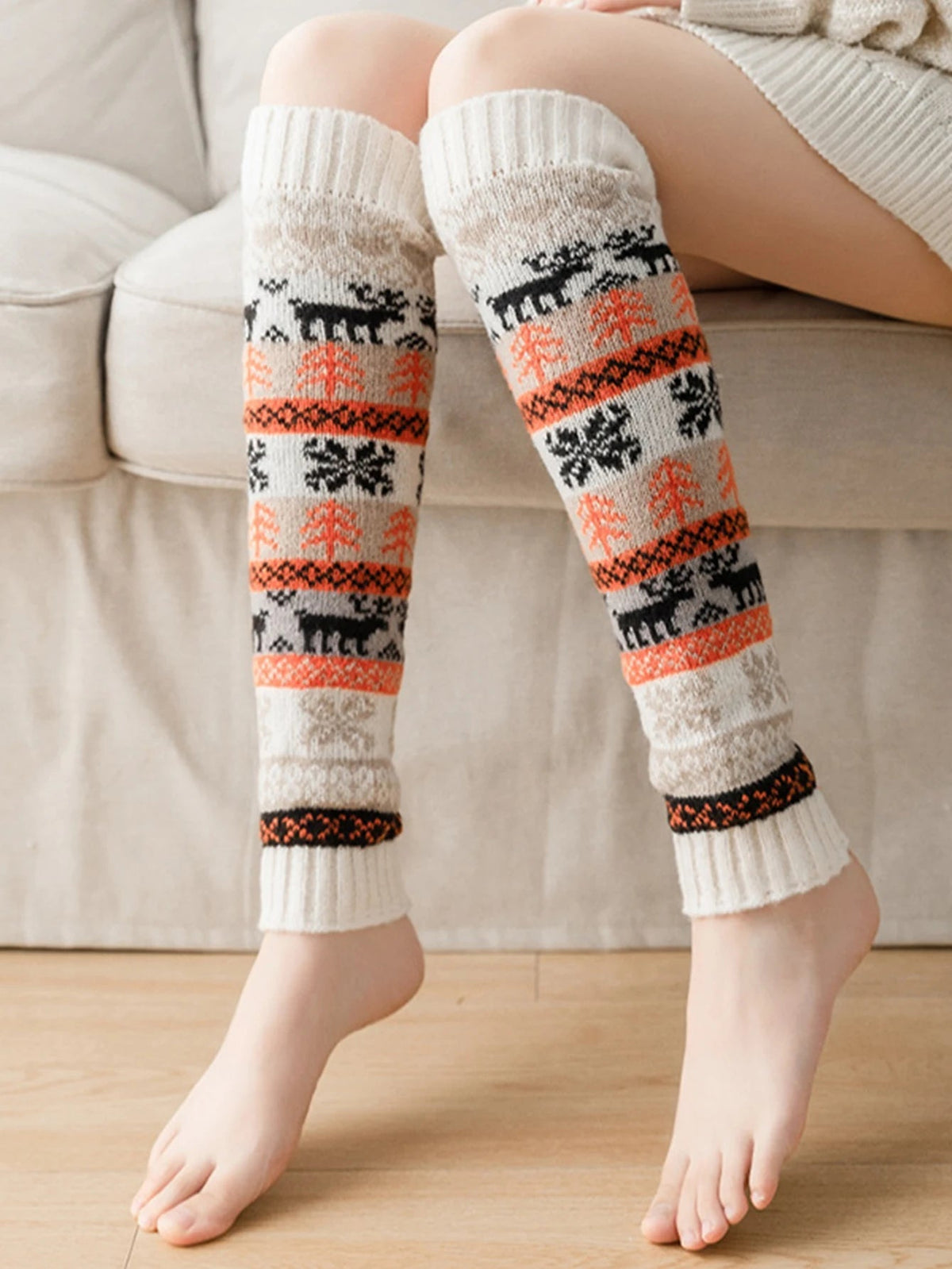 White Belro cozy knit leg warmer for fall and winter, made of soft, warm fabric, perfect for cold weather outfits.
