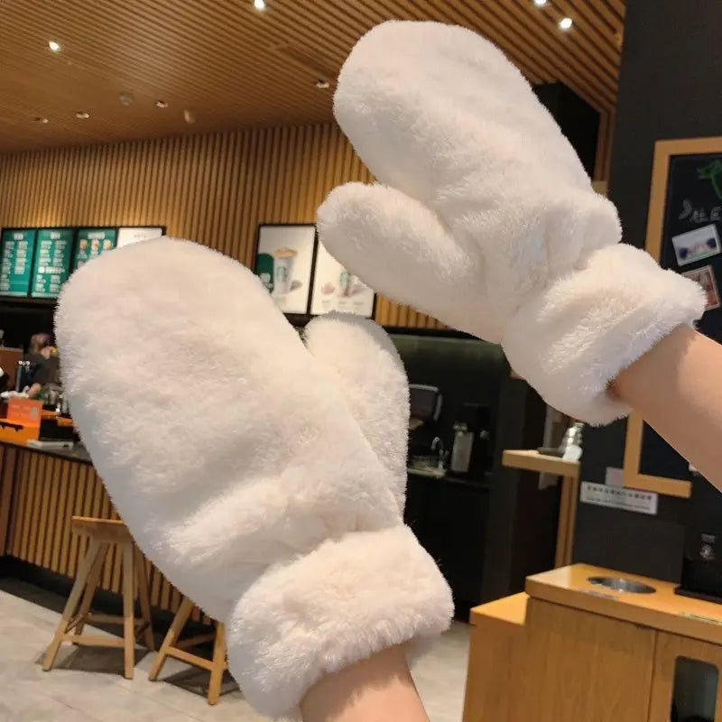 White fluffy plush mittens by Belro, warm winter gloves designed for cozy outdoor wear and cold weather comfort.