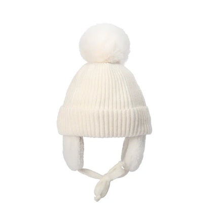 White kids knit beanie with earflaps, Belro winter hat for children, cozy and warm accessory for cold weather.