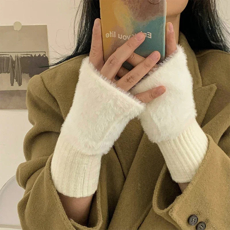 White plush cozy fingerless gloves for women by Belro, soft and warm with a comfortable fit.