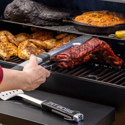 Casavibeo Pit Boss Sportsman 850 pellet grill with stainless steel exterior and four cooking racks, ideal for outdoor grilling and smoking.